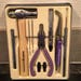 Tool Kit. Making Memories Detail Tool Kit.Color Eyelets Included.