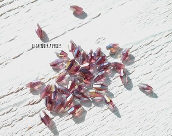 Pearls warheads faceted Light Amethyst AB * 4 x 8 mm (10 beads)