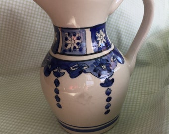 blue and white pitcher