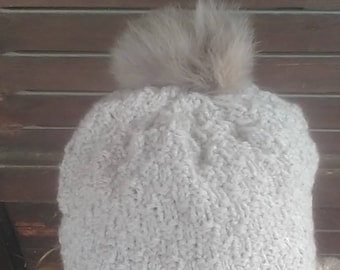 Knitted hat with real fur pom pom