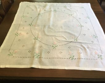 Hand embroidered table cloth.