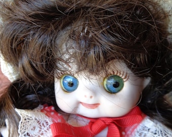 1976 ooak, Google eyes, all ceramic/bisque 8" doll, artist signed
