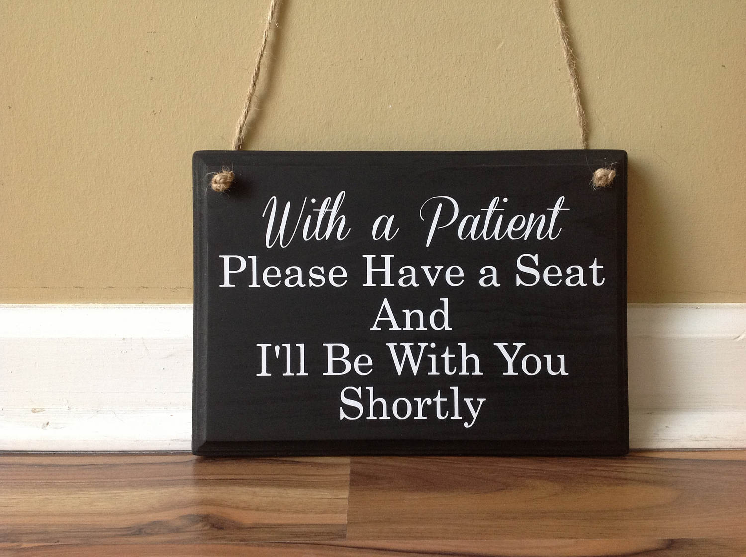 With a patient please have a seat and I'll be with you