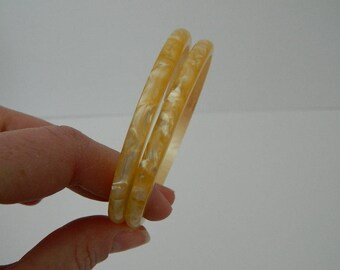 Set of 2 Vintage Apricot Pearloid Bangles