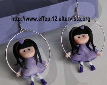 Hypoallergenic with dolls on swings