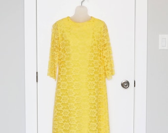 1960s sunny yellow lace 1960s dress with three quarter bell sleeves