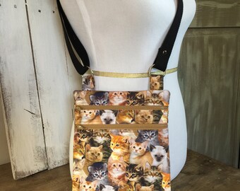 Cats, Zip and Go Bag, with an Adjustable Strap.