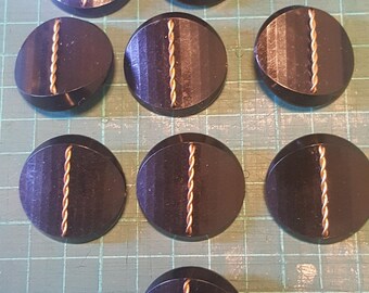 10 black and metal buttons from the 1960's