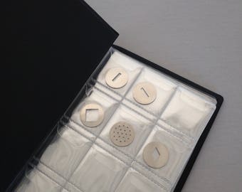 Extruder Disc storage album, this little album is perfect to store up to 120 extruder disc clear sleeves make finding your disc easy.