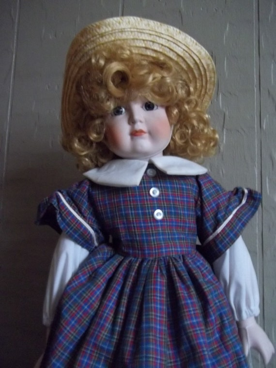 Antique Guild's Porcelain Megan 19 inch doll