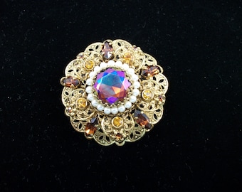 SALE Vintage gold tone and topaz rhinestone brooch.
