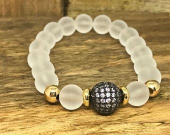 Glass White Beaded Bracelet with gold field beads and some bling.