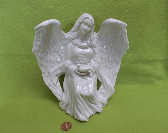 Blue White Sitting Angel holding Dove