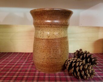 Light rust pottery utensil holder