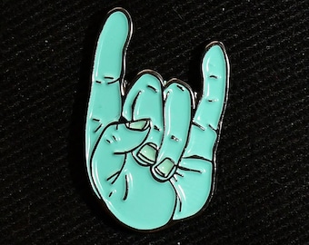 The Hand of Rock Lapel Pin