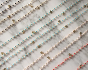 Long rosary with golden stars. BASIC Collection