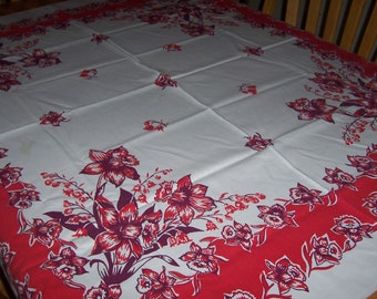 Vintage tablecloth with red daffodils