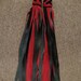 pair of red finger floggers