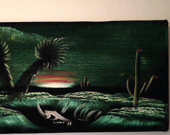 Vintage black velvet painting perfect desert sunset with skull