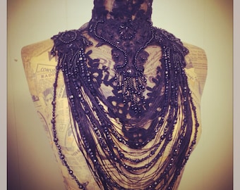 Black beaded victorian lace collar with ornate beading and fringing.