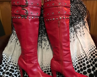 Vintage red faux leather over the knee boots.