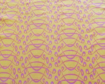 1 yd.--Polyester knit in Orange and Fuschia print