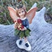 Mini Christmas Fairy holding present