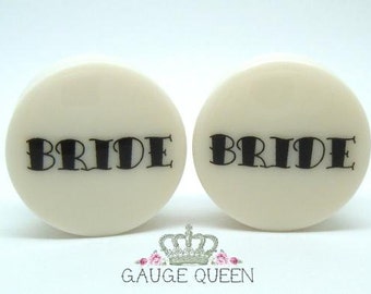Bride / Groom Plugs. 4g / 5mm, 2g / 6.5mm, 0g / 8mm, 00g / 10mm, 1/2" / 12.5mm, 9/16" / 14mm, 5/8" / 16mm, 3/4" /19mm, 7/8" /22mm, 1" /25mm