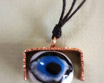 On sale -30% Glass eyeball in copper pendant