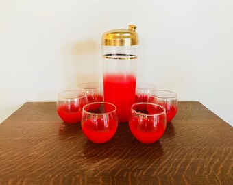 Red Blendo shaker and 6 glasses