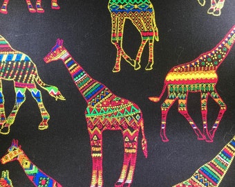 Colorful giraffes in black cotton fabric. Hi-Fashion Fabrics. Quilting Cotton Fabrics. Choose your cut.