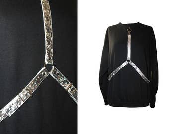Sweatshirt with removable harness in holographic leather