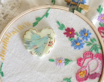 Ceramic Porcelain Heart Needleminder, Painted Blue Bird on Lime Green and Brown Background