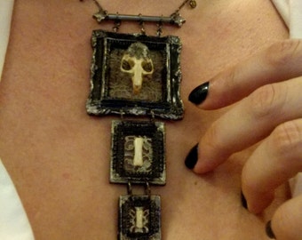 Taxidermy jewelry, morbid frames