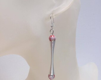 These earrings is 2 red marbled beads