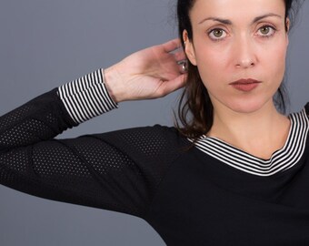Black and white sweatshirt with drilled sleeves