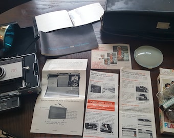 Vintage Polaroid Land Camera 101 Automatic with Genuine Leather Carry Case, Instructions, Polaroid Flash and Sylvania Flashbulbs SALE