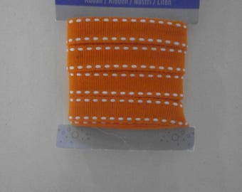 3 metres of orange Ribbon stitched in white