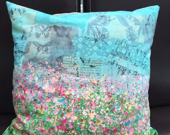 Splatter flower cushion
