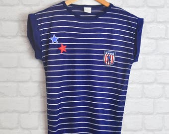 90s PVintage Navy Striped T-shirt with Retro Badge Front.