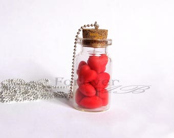 Bottle necklace with hearts