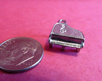 Twenty Pewter Piano Charms