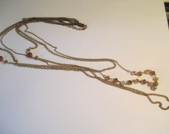 Vintage Jewelry gold tone 3 chain waterfall necklace with faceted crystal beads 42 inch no markings.
