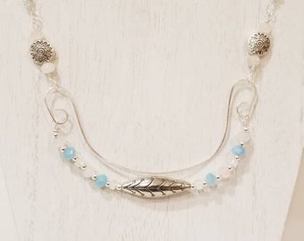 Silver wirework and crystal necklace