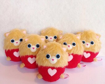 A Love Kitten (each sold separately)