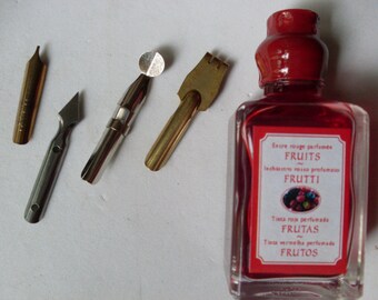 pennini e inchiostro, ink and nibs - red ink scented with red fruits with nibs of various dimensions, 2 nibs for writing 2 nibs for drawing