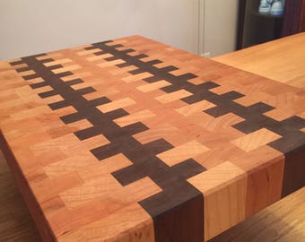 Handmade maple walnut and cherry end grain cutting board