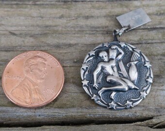 Vintage Bell Trading Post Aquarius Zodiac Pendant