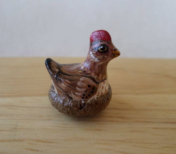 small bird figurine