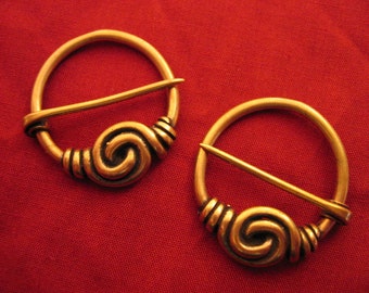Pair of Spiral Annular Brooches
